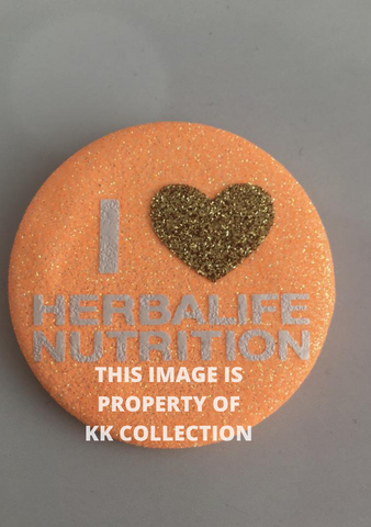 Neon orange and gold glitter button with black