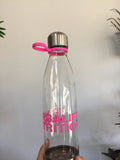 Clear bottle with pink tag and logo