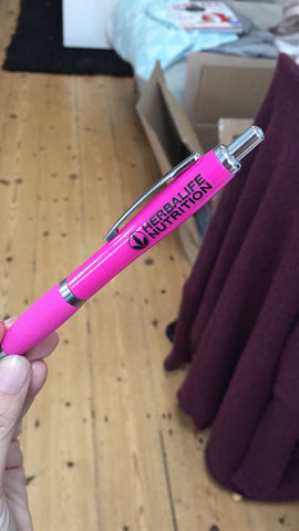 Bright pink branded pen